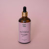 Bottle of natural Grow Glow Hair and Scalp Oil. Our Scalp oil contains no harsh ingredients.