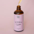 Bottle of natural Grow Glow Hair and Scalp Oil. Our Scalp oil contains no harsh ingredients.