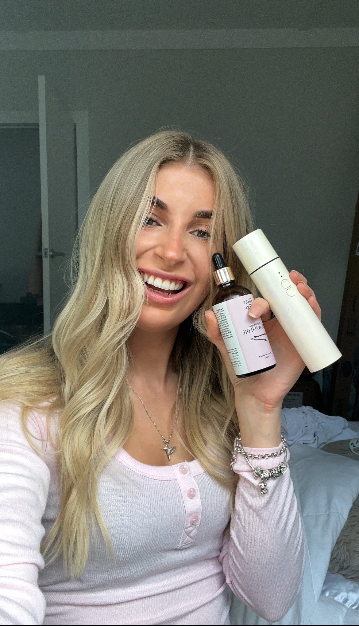 Happy customer after using Grow Glow Hair and Scalp Kits with long healthy hair.